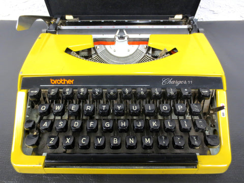 Vintage Yellow Brother Charger 11 Portable Typewriter, Retro Look, Black Case